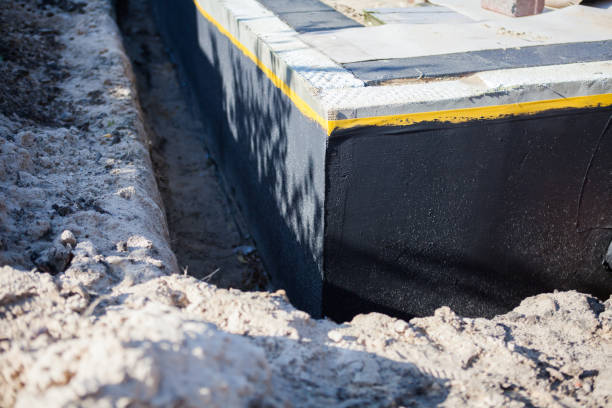 Professional Emergency Waterproofing technician working in Bay Shore, NY